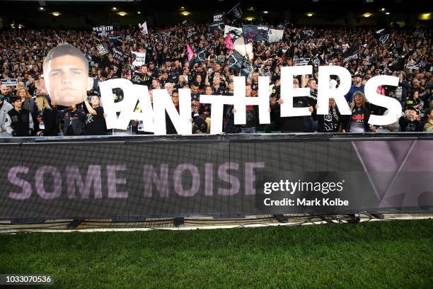 Panthers supporters cheer during the NRL Semi Final match between the Cronulla Sharks and the Penrith Panthers at Allianz Stadium on September 14,...