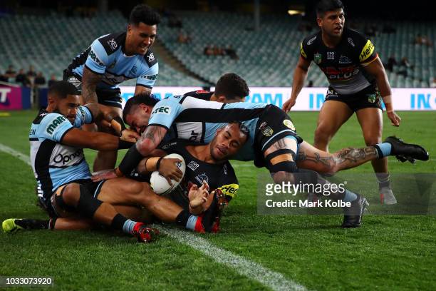 Christian Crichton of the Panthers is tackled into touch during the NRL Semi Final match between the Cronulla Sharks and the Penrith Panthers at...