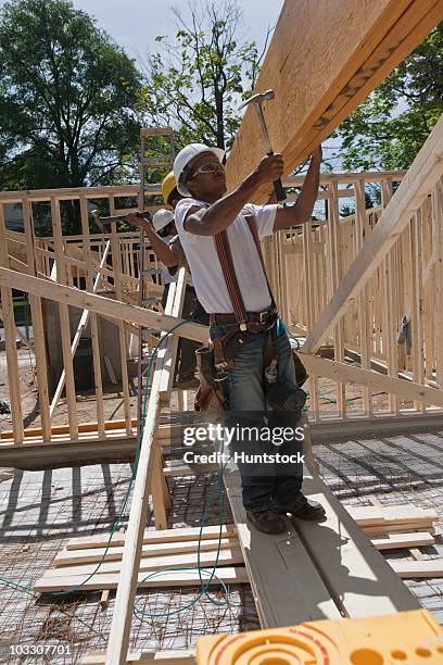 Carpenters Working on Construction Site