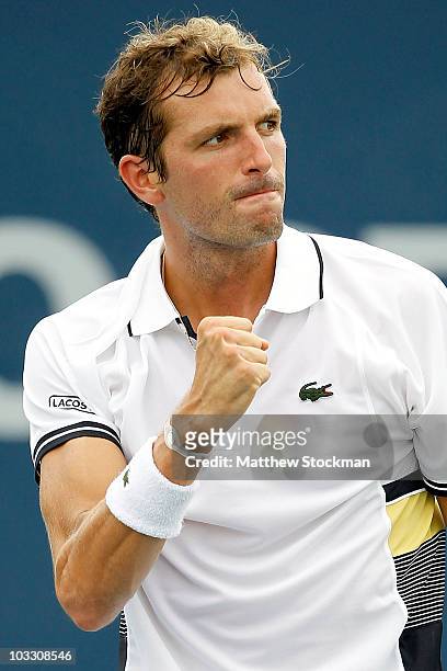 Julien Benneteau of France celebrates match point against Denis Istomin of Uzebekistan during the Rogers Cup at the Rexall Centre on August 9, 2010...