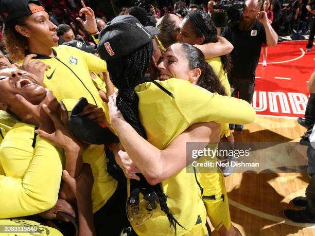 Crystal Langhorne hugs Sue Bird of the Seattle Storm after winning the WNBA Championship against the Washington Mystics during Game Three of the 2018...