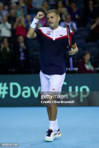 Dan Evans of Great Britain celebrates in his match against Denis Istomin of Uzbekistan during day one of the Davis Cup by BNP Paribas World Group...