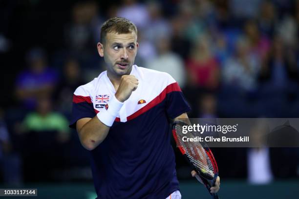 Dan Evans of Great Britain celebrates in his match against Denis Istomin of Uzbekistan during day one of the Davis Cup by BNP Paribas World Group...