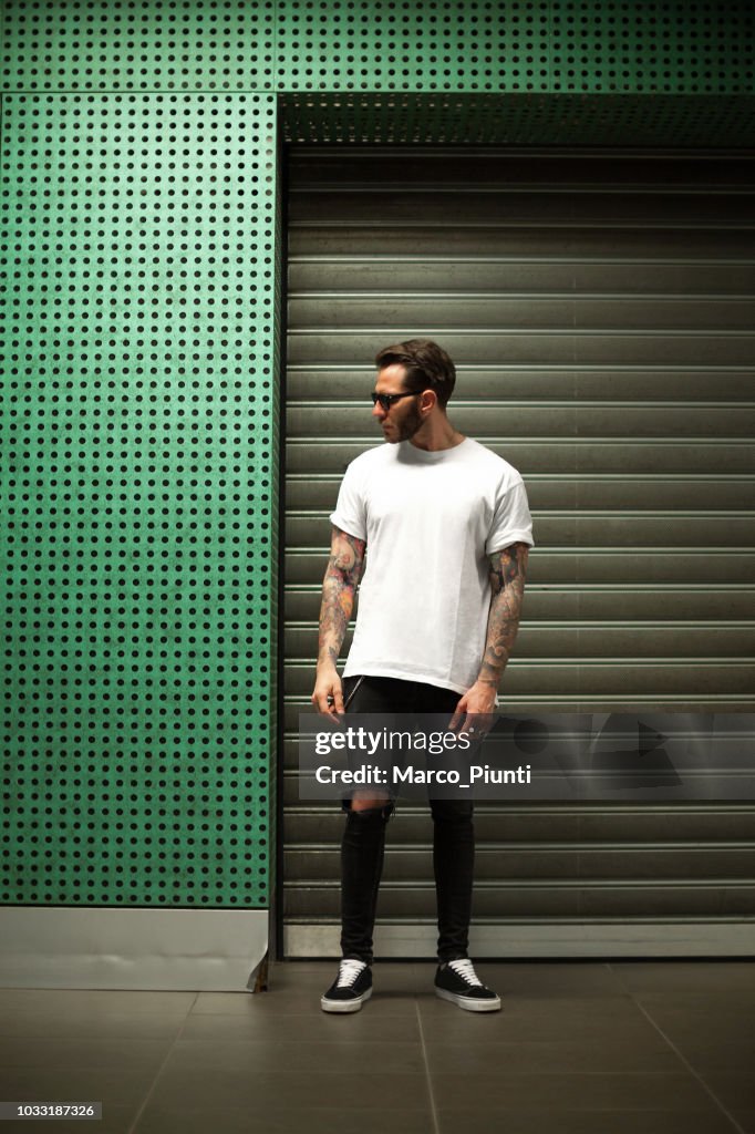 Portrait of tattooed young man