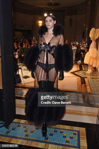 Model walks the runway at the Pam Hogg show during London Fashion Week September 2018 at The Freemason's Hall on September 14, 2018 in London,...