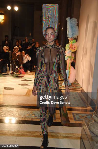 Model walks the runway at the Pam Hogg show during London Fashion Week September 2018 at The Freemason's Hall on September 14, 2018 in London,...