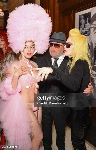 Ellie Rae Winstone, Ray Winstone and Pam Hogg pose backstage at the Pam Hogg show during London Fashion Week September 2018 at The Freemason's Hall...