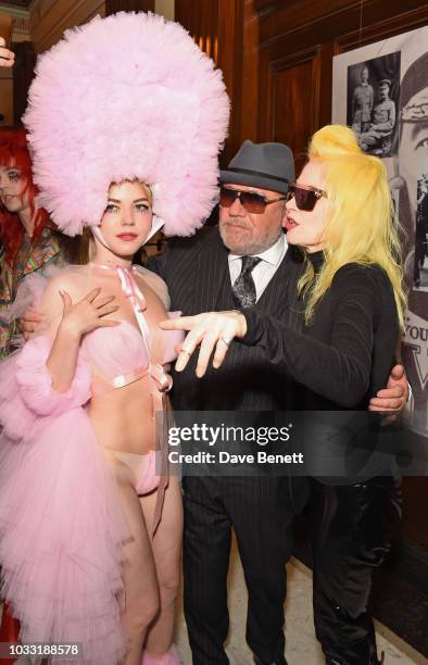 Ellie Rae Winstone, Ray Winstone and Pam Hogg pose backstage at the Pam Hogg show during London Fashion Week September 2018 at The Freemason's Hall...