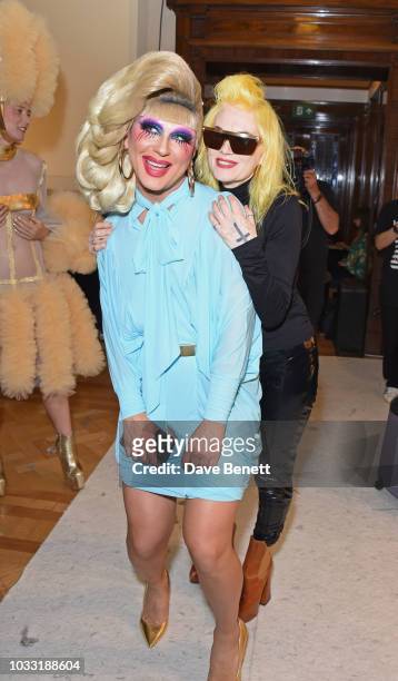 Jodie Harsh and Pam Hogg pose backstage at the Pam Hogg show during London Fashion Week September 2018 at The Freemason's Hall on September 14, 2018...