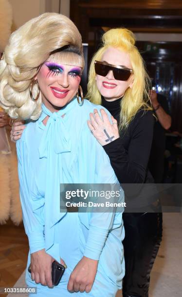 Jodie Harsh and Pam Hogg pose backstage at the Pam Hogg show during London Fashion Week September 2018 at The Freemason's Hall on September 14, 2018...