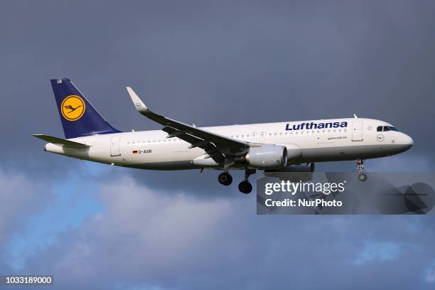 An Airbus A320-200 from Lufthansa is landing at Amsterdam Schiphol Airport in the Netherlands. The aircraft is an Airbus A320-200 produced in 2016...