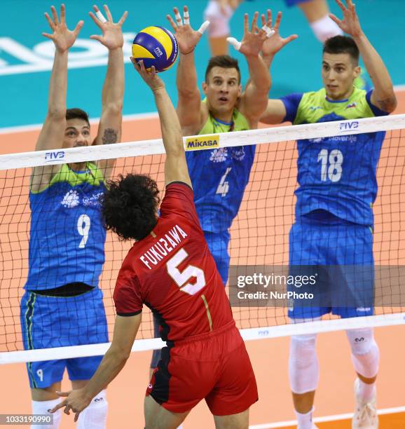 Japan v Slovenia - FIVP Men's World Championship Tatsuya Fukuzawa of Japan agains the Slovenia wall at Mandela Forum in Florence, Italy on September...