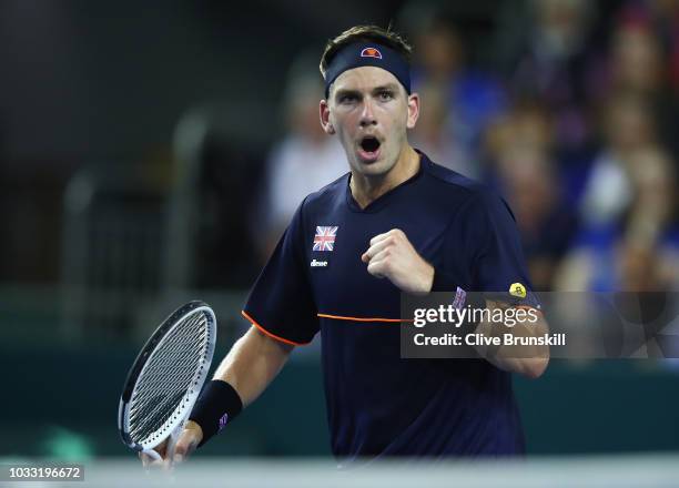 Cameron Norrie of Great Britain celebrates a point in his match against Jurabek Karimov of Uzbekistan during day one of the Davis Cup match between...