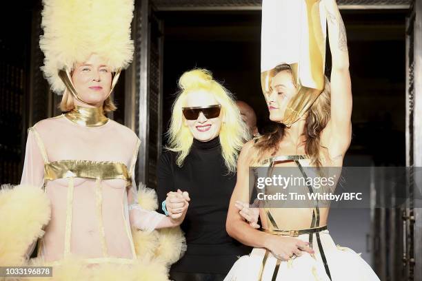 Roisin Murphy, Pam Hogg and Alice Dellal walk the finale of the Pam Hogg Show during London Fashion Week September 2018 at Freemasons Hall on...