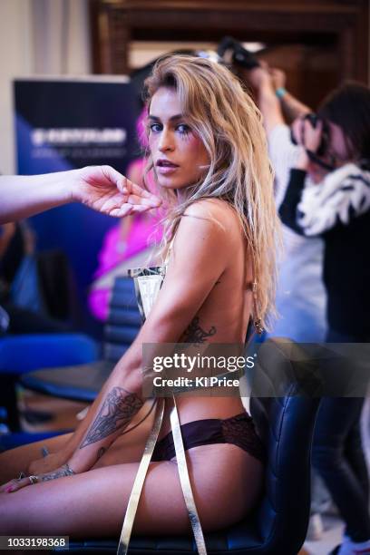 Alice Dellal backstage ahead of the Pam Hogg Show during London Fashion Week September 2018 at Freemasons Hall on September 14, 2018 in London,...