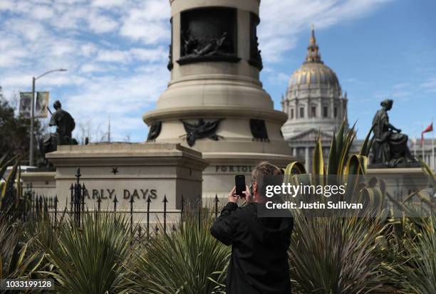 Concrete pedestal reamains where a statue known as 'Early Days' that depicted a Native American at the feet of a Catholic missionary and Spanish...