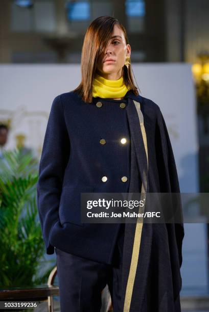 Model poses at the Johnstons of Elgin presentation during London Fashion Week September 2018 at Waldorf Hotel, on September 14, 2018 in London,...