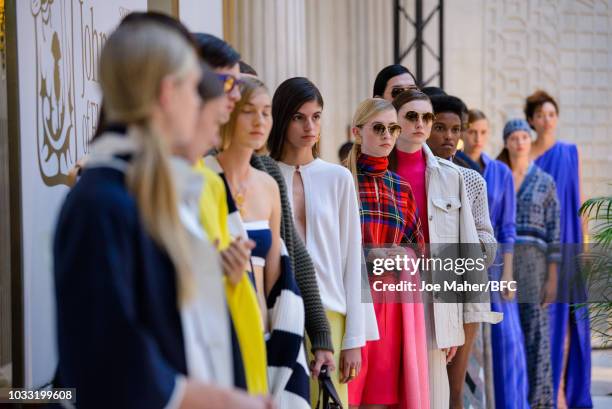 Models backstage ahead of the Johnstons of Elgin presentation during London Fashion Week September 2018 at Waldorf Hotel on September 14, 2018 in...