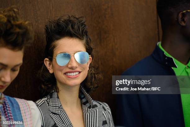 Model backstage ahead of the Johnstons of Elgin presentation during London Fashion Week September 2018 at Waldorf Hotel on September 14, 2018 in...