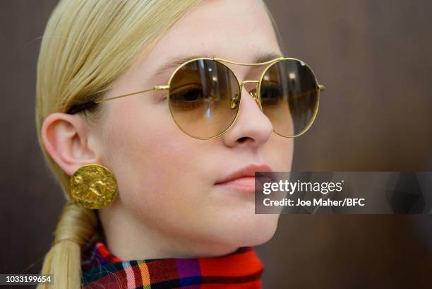 Model backstage ahead of the Johnstons of Elgin presentation during London Fashion Week September 2018 at Waldorf Hotel on September 14, 2018 in...