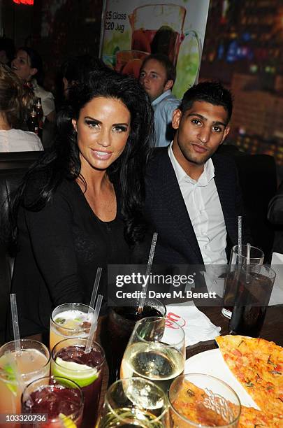 Katie Price and Amir Khan attend an after party for the UK film premiere of The Expendables at Planet Hollywood on August 9, 2010 in London, England.