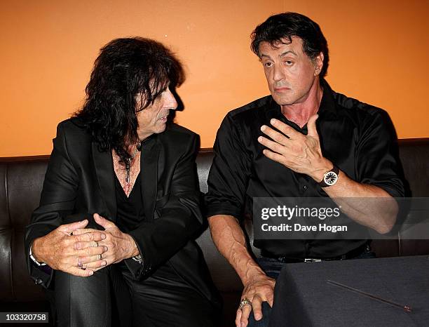 Singer Alice Cooper and actor Sylvester Stallone attend the UK film premiere of 'The Expendables' after party at Planet Hollywood on August 9, 2010...