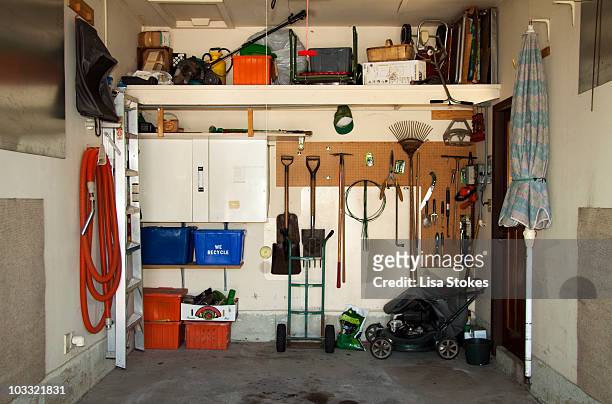 organized garage - garage doors stock pictures, royalty-free photos & images