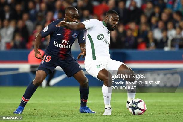 Paris Saint-Germain's French midfielder Lassana Diarra vies for the ball with Saint-Etienne's French midfielder Yannis Salibur during the French L1...