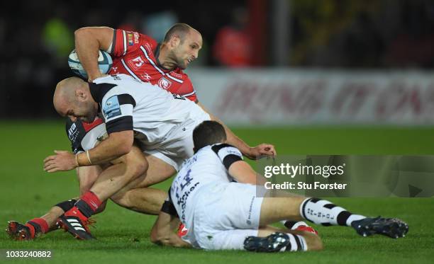 Gloucester wing Charlie Sharples is tackled by Shaun Malton during the Gallagher Premiership Rugby match between Gloucester Rugby and Bristol Bears...