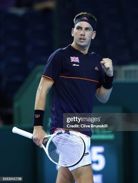 Cameron Norrie of Great Britain celebrates a point in his match against Jurabek Karimov of Uzbekistan during day one of the Davis Cup match between...