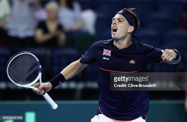 Cameron Norrie of Great Britain celebrates a point in his match against Jurabek Karimov of Uzbekistan during day one of the Davis Cup match between...