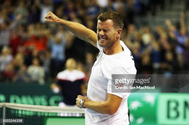 Great Britain captain Leon Smith celebrates as Dan Evans clinches victory over Dennis Istomin during Day One of The Davis Cup match between Great...