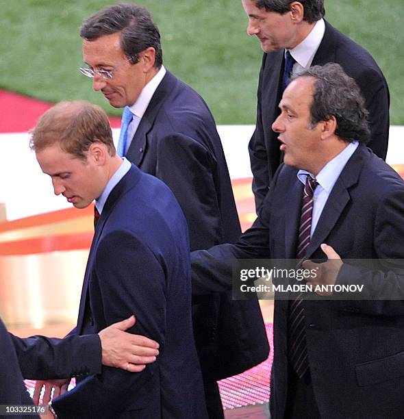 Head of the UEFA Michel Platini greets Britain's Prince William and President of the Italian Parliament Gianfranco Fini prior the UEFA football...