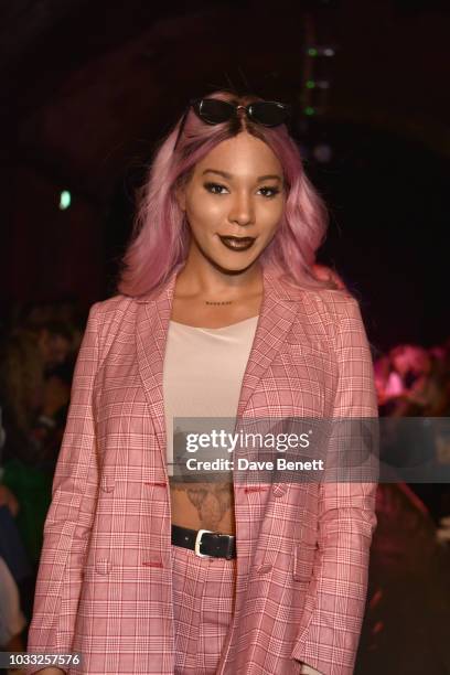 Munroe Bergdorf attends the Ashley Williams front row during London Fashion Week September 2018 at House of Vans on September 14, 2018 in London,...