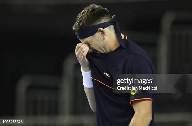 Cameron Norrie of Great Britain reacts after loosing his match against Jurabek Karimov of Uzbekistan during day one of the Davis Cup by BNP Paribas...