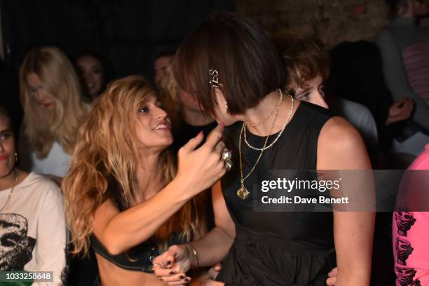 Alice Dellal and Daisy Lowe attend the Ashley Williams front row during London Fashion Week September 2018 at House of Vans on September 14, 2018 in...