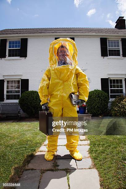 man going to work in haz mat suit - hazmat suit ストックフォトと画像