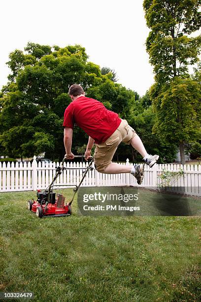 happy to be mowing - grasmaaier stockfoto's en -beelden