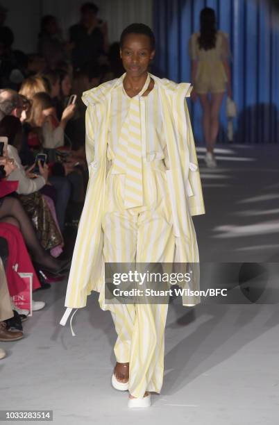 Models walk the runway at the Xiao Li Show during London Fashion Week September 2018 at The BFC Show Space on September 14, 2018 in London, England.