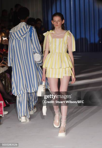 Models walk the runway at the Xiao Li Show during London Fashion Week September 2018 at The BFC Show Space on September 14, 2018 in London, England.