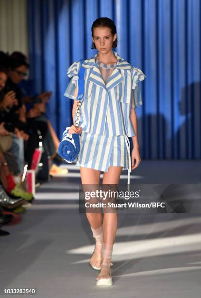 Models walk the runway at the Xiao Li Show during London Fashion Week September 2018 at The BFC Show Space on September 14, 2018 in London, England.