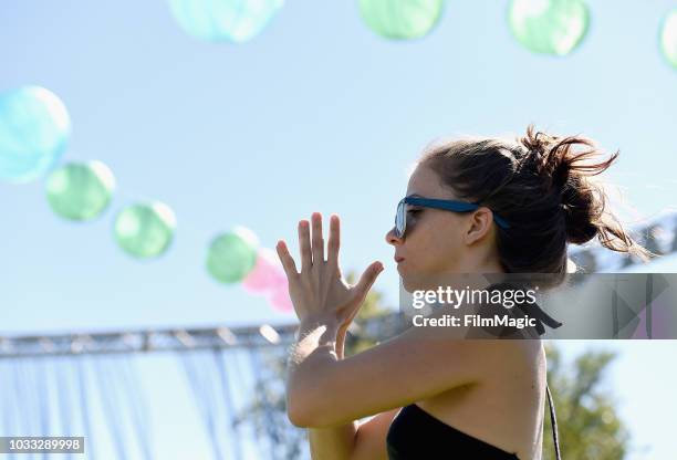 Festivalgoer attends Dead Set Yoga with Sunny Trails at The Break Room during day 1 of Grandoozy on September 14, 2018 in Denver, Colorado.