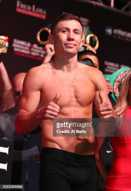 Middleweight champion Gennady Golovkin poses on the scale during his official weigh-in at T-Mobile Arena on September 13, 2018 in Las Vegas, Nevada....