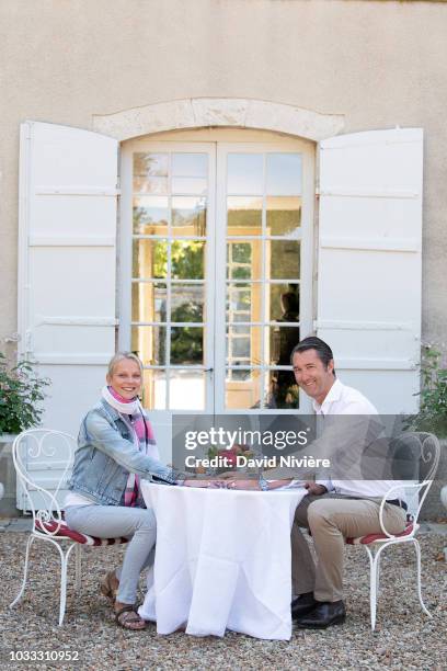 Princess Helene Of Yugoslavia and Stanislas Fougeron pose together in the family castle of Villeprevost On September 7, 2018 in Tillay-le-Peneux,...