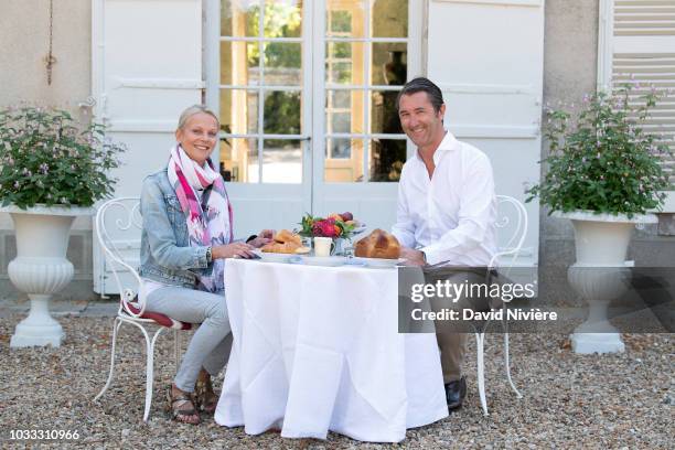 Princess Helene Of Yugoslavia and Stanislas Fougeron pose together in the family castle of Villeprevost On September 7, 2018 in Tillay-le-Peneux,...