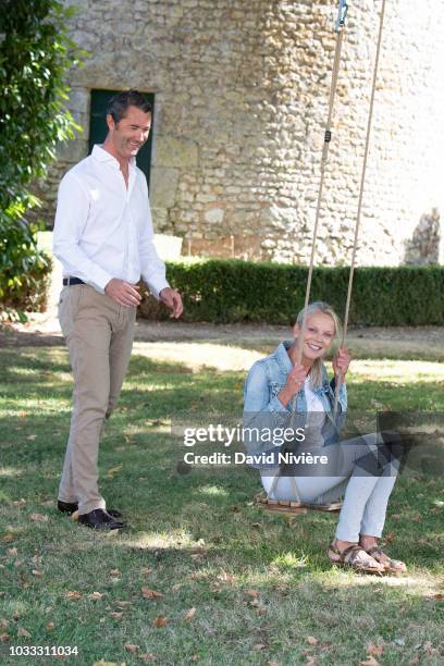 Princess Helene Of Yugoslavia and Stanislas Fougeron pose together in the family castle of Villeprevost On September 7, 2018 in Tillay-le-Peneux,...