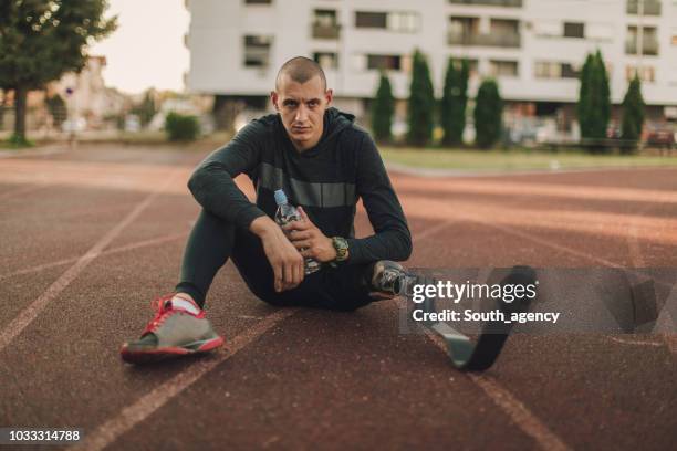 disability athlete taking a brake - disabled sportsperson stock pictures, royalty-free photos & images