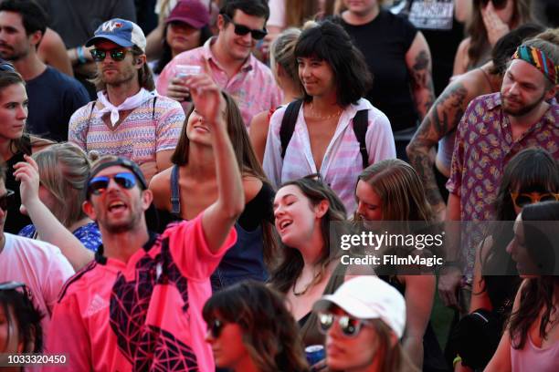 Festivalgoers attend the Tennis performance on the Paper Stage during day 1 of Grandoozy on September 14, 2018 in Denver, Colorado.