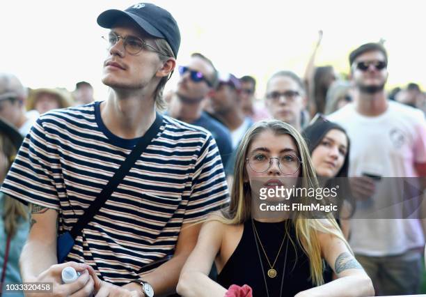Festivalgoers attend the Tennis performance on the Paper Stage during day 1 of Grandoozy on September 14, 2018 in Denver, Colorado.