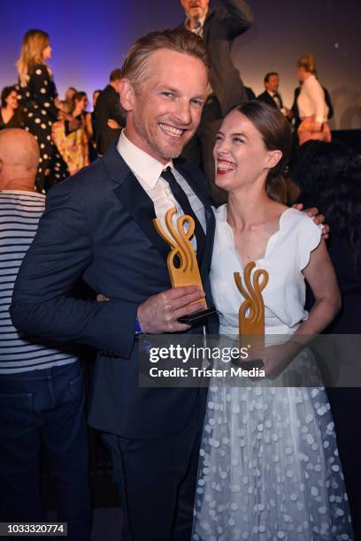 Dutch actor Barry Atsma and Paula Beer attend the Deutscher Schauspielpreis 2018 at Zoo Palast on September 14, 2018 in Berlin, Germany.